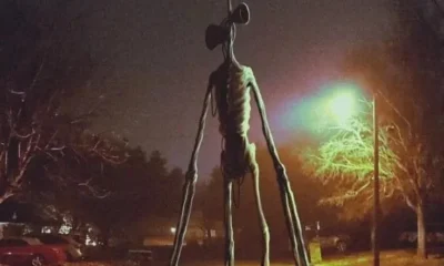 Siren Head, the towering internet-famous horror creature created by Trevor Henderson, inspiring the upcoming Warner Bros. movie.